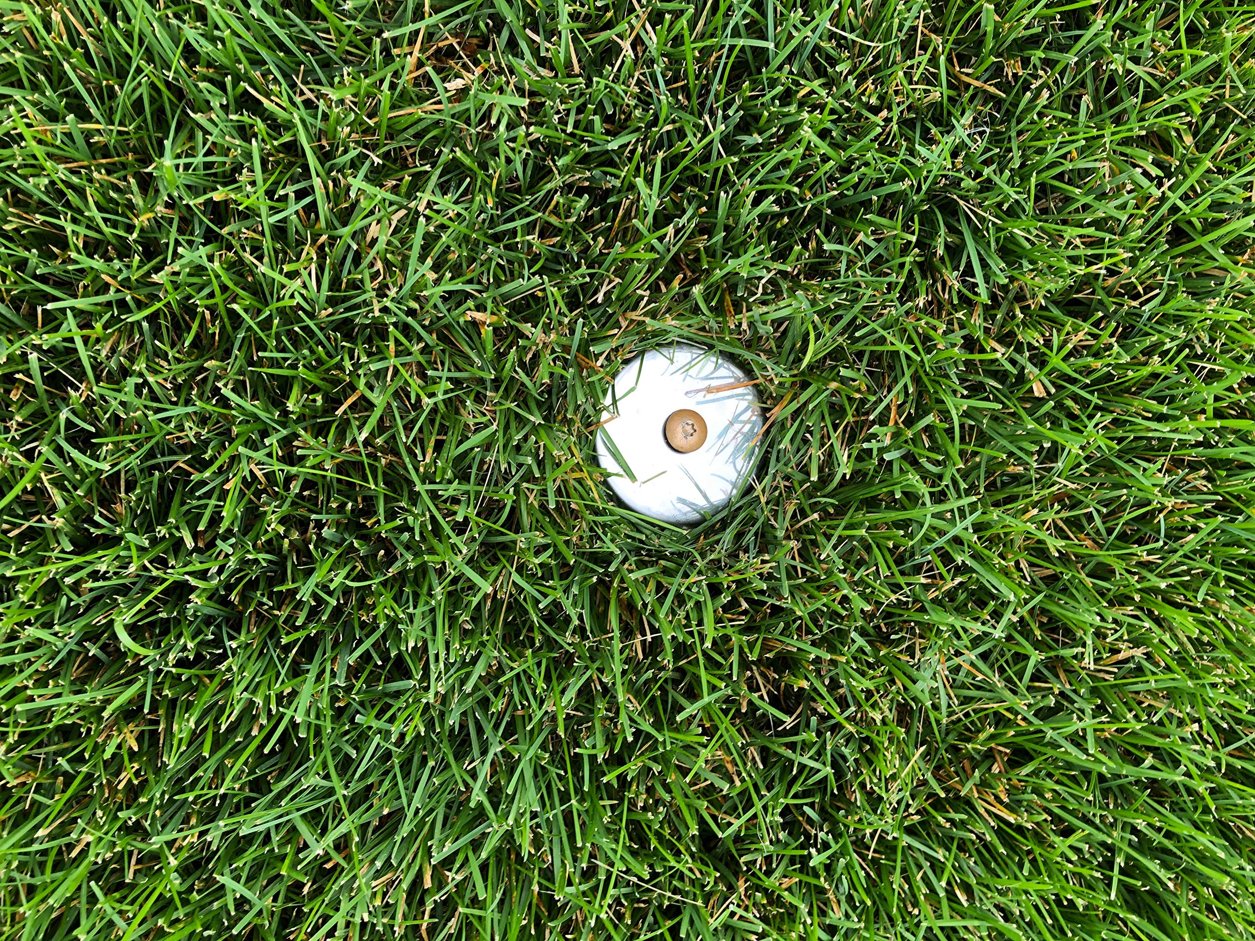 Keyfit Tools installed in lawn illustrating secure anchoring and discrete visibility benefit