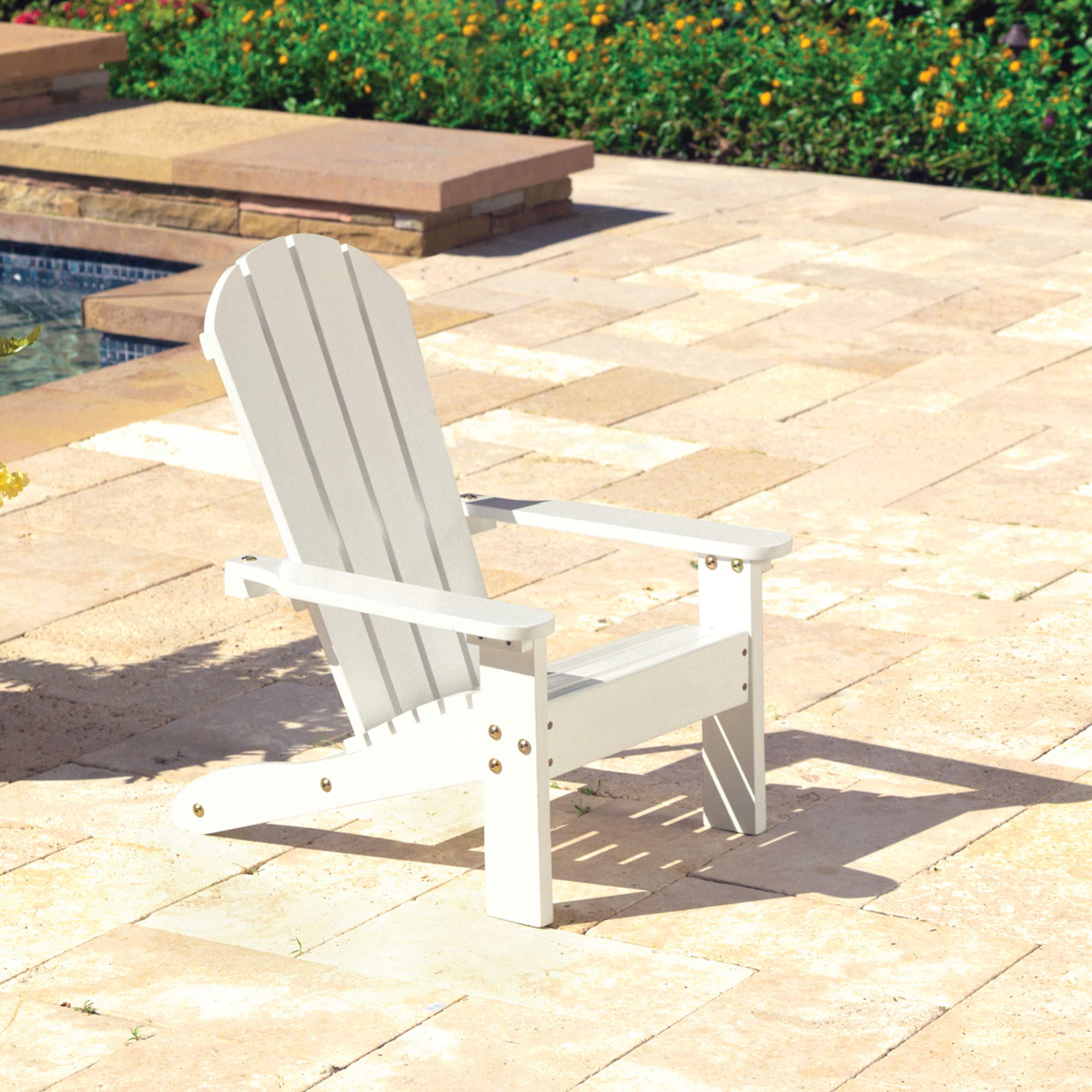 KidKraft child seated on white Adirondack chair enjoying comfortable relaxed posture