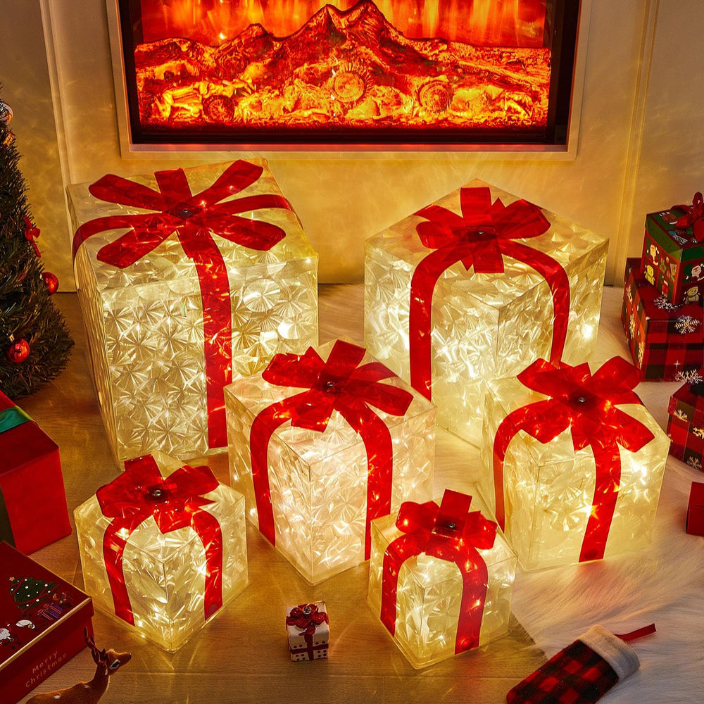 Kigley mantel display of illuminated presents adding cozy fireplace charm