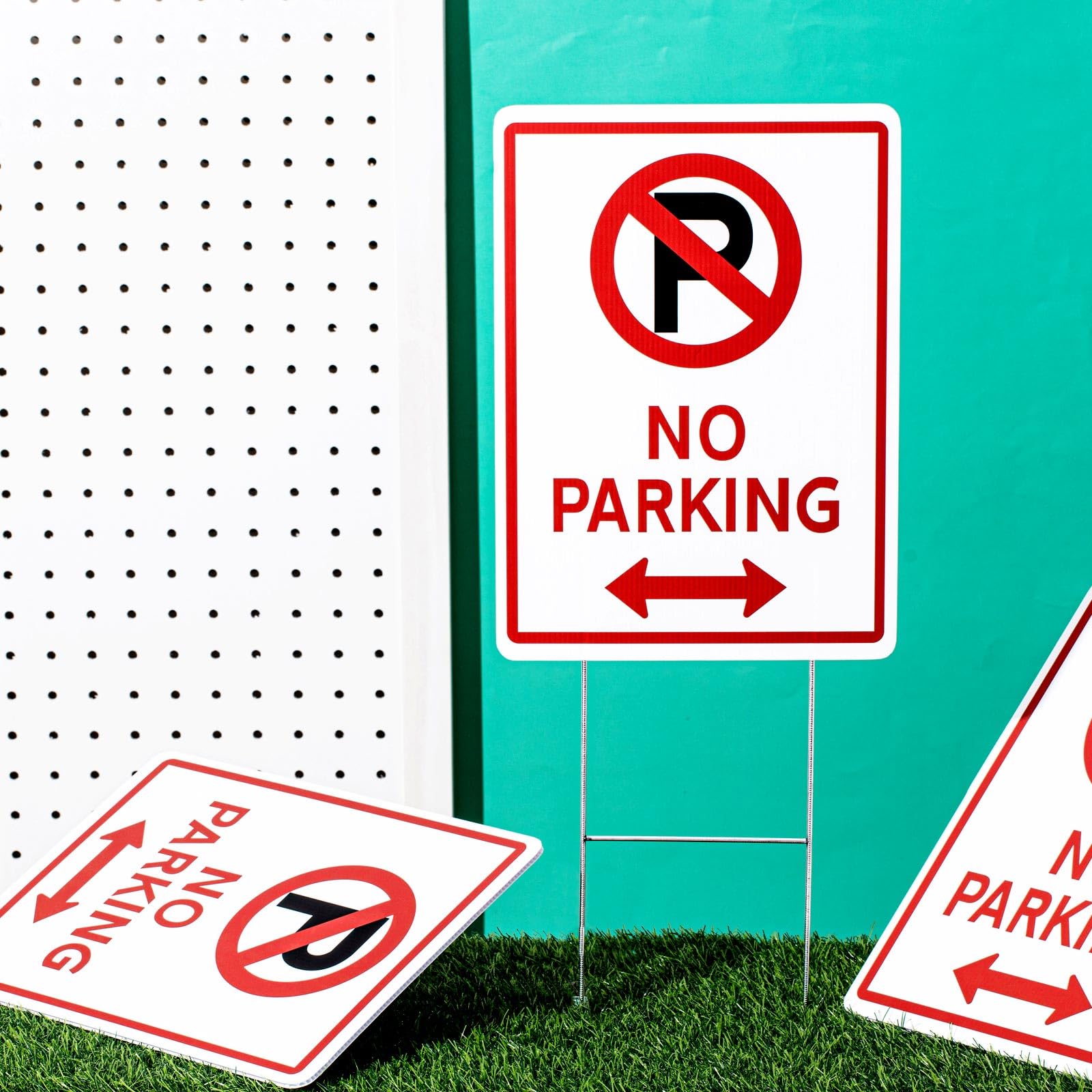 Kigley sign next to shoe for scale showing size and readability benefit