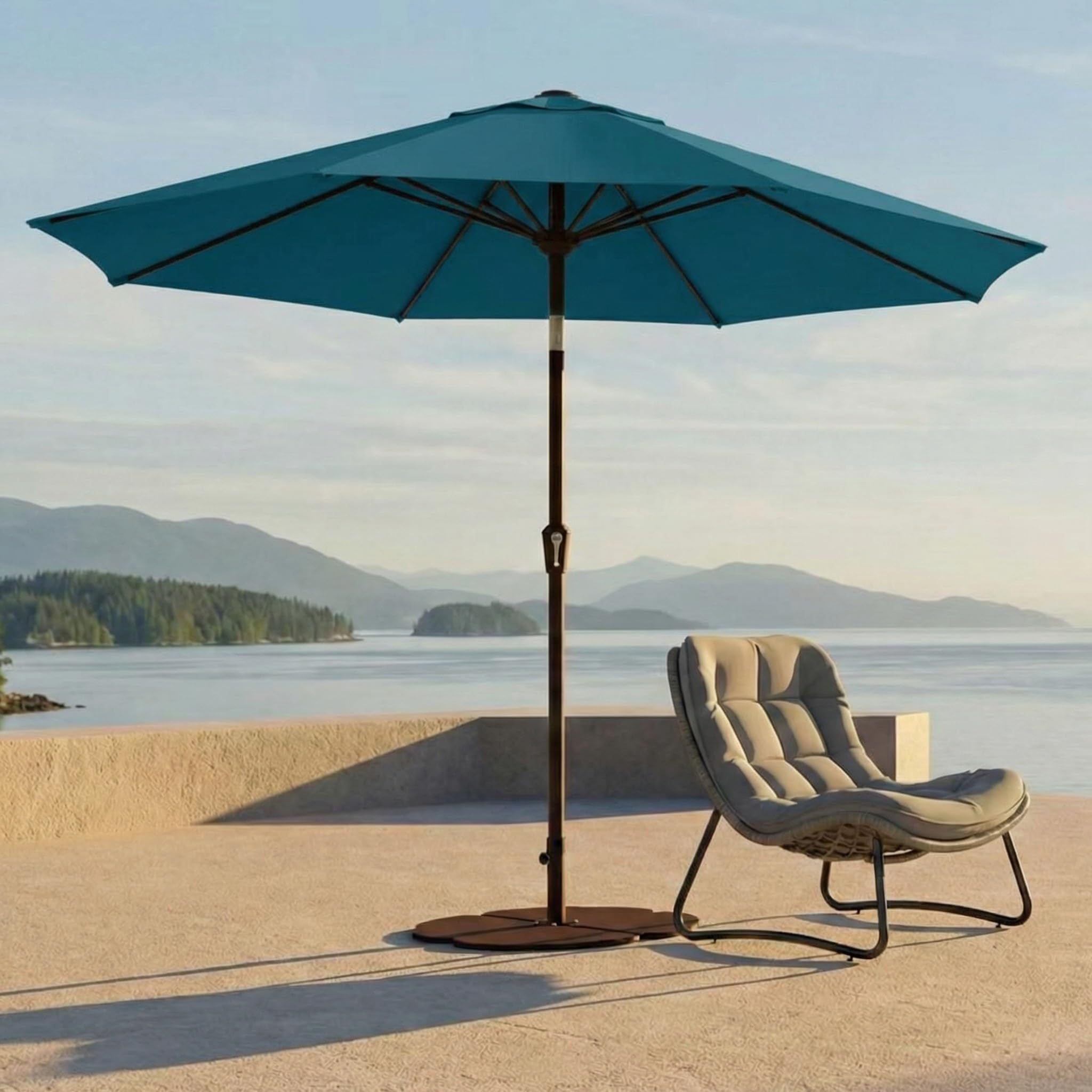 Kingdura umbrella next to chair illustrating 9ft scale and fit