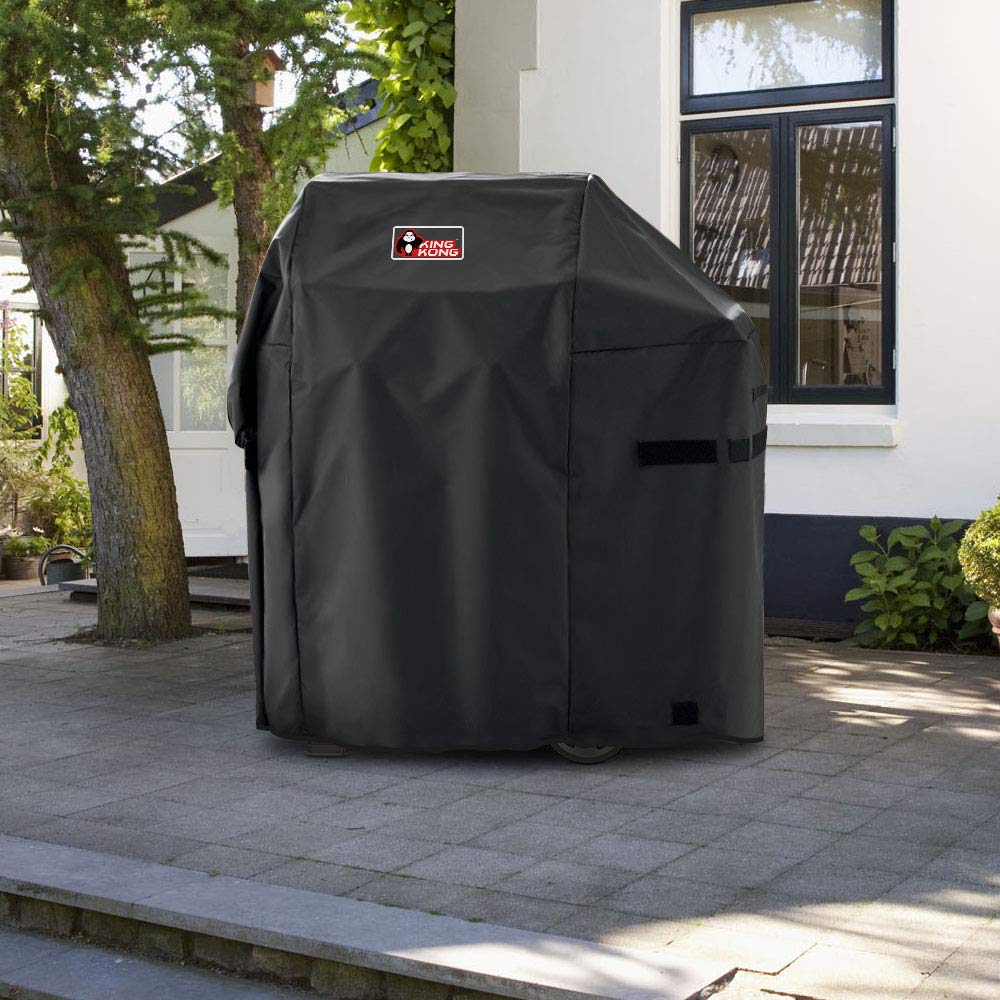 Kingkong cover in use in rain protecting Weber grill from moisture