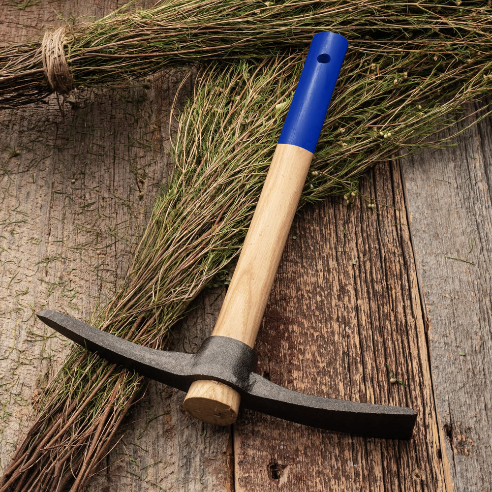 Kings County Tools lifestyle shot in a garden bed showing practical use