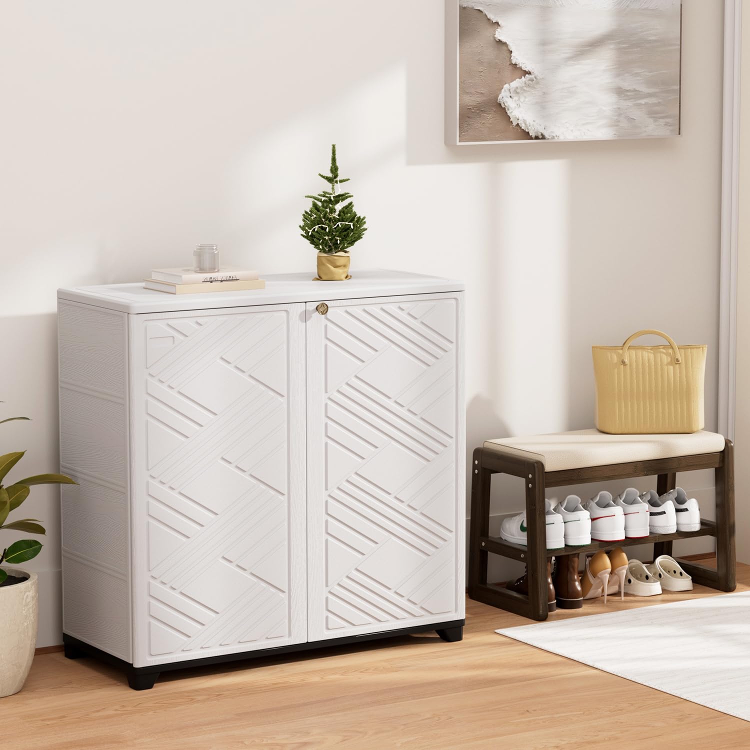 KINYING next to chair for scale illustrating compact 60-gallon capacity