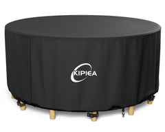 Kipiea front view of round table cover protecting outdoor furniture
