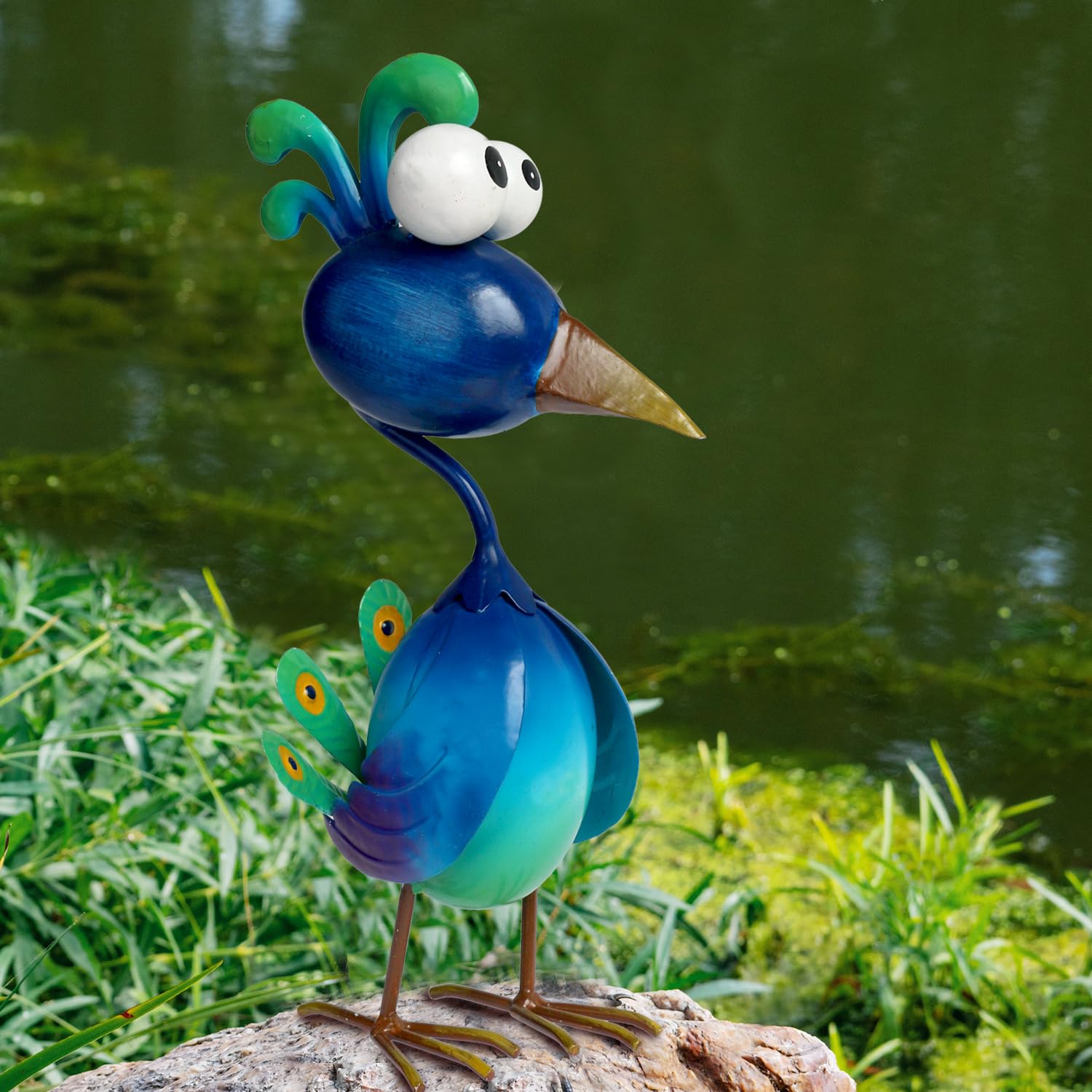 Kircust peacock next to planter for scale showing compact footprint advantage