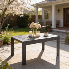 Kiss the Water front view deep grey table showing modern silhouette and durable finish