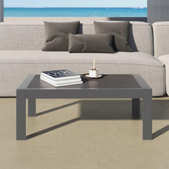 Kiss the Water table in use on patio with drinks and plants showing functional styling