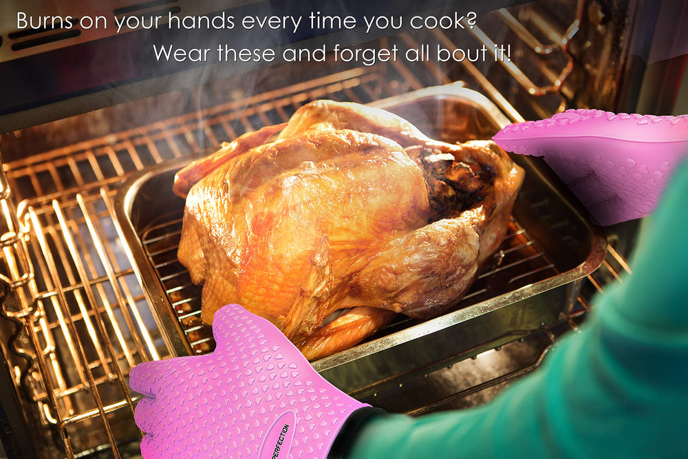 Kitchen Perfection gloves in use lifting hot grill grate for safer handling