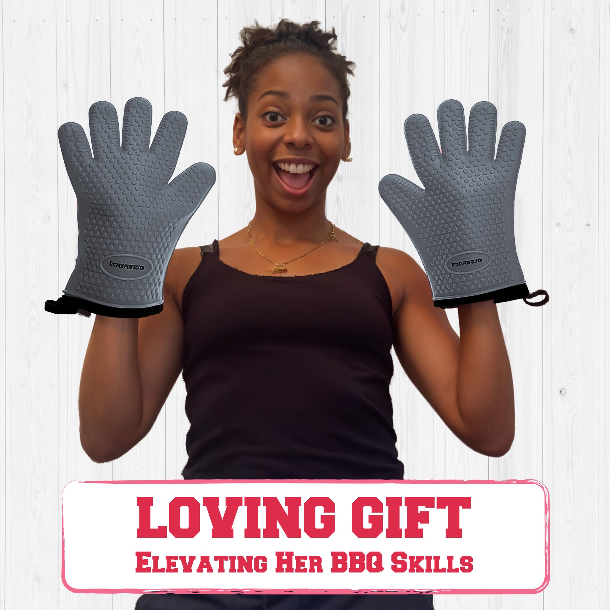 Kitchen Perfection sticky hanger attached to wall with gloves for compact storage