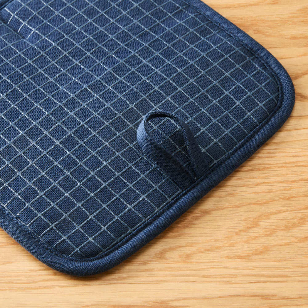 KitchenAid pot holder attached to fridge magnet for easy storage access