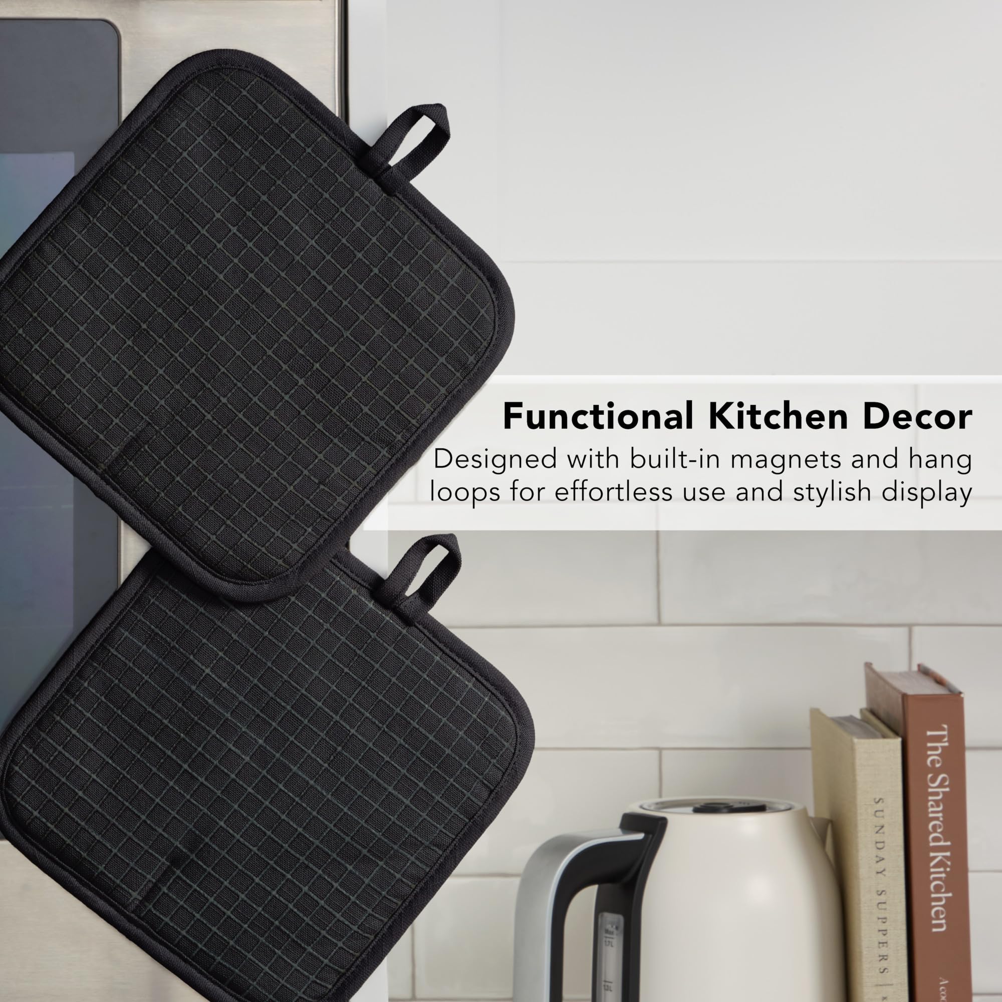 KitchenAid next to a wooden spoon showing compact 8x8 size convenience