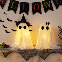 KIWDY ghosts placed on mantel adding layered Halloween atmosphere