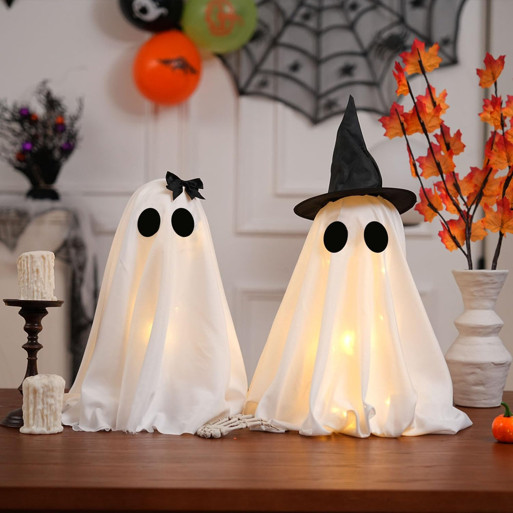 KIWDY ghosts in a decorated party scene creating festive lighting