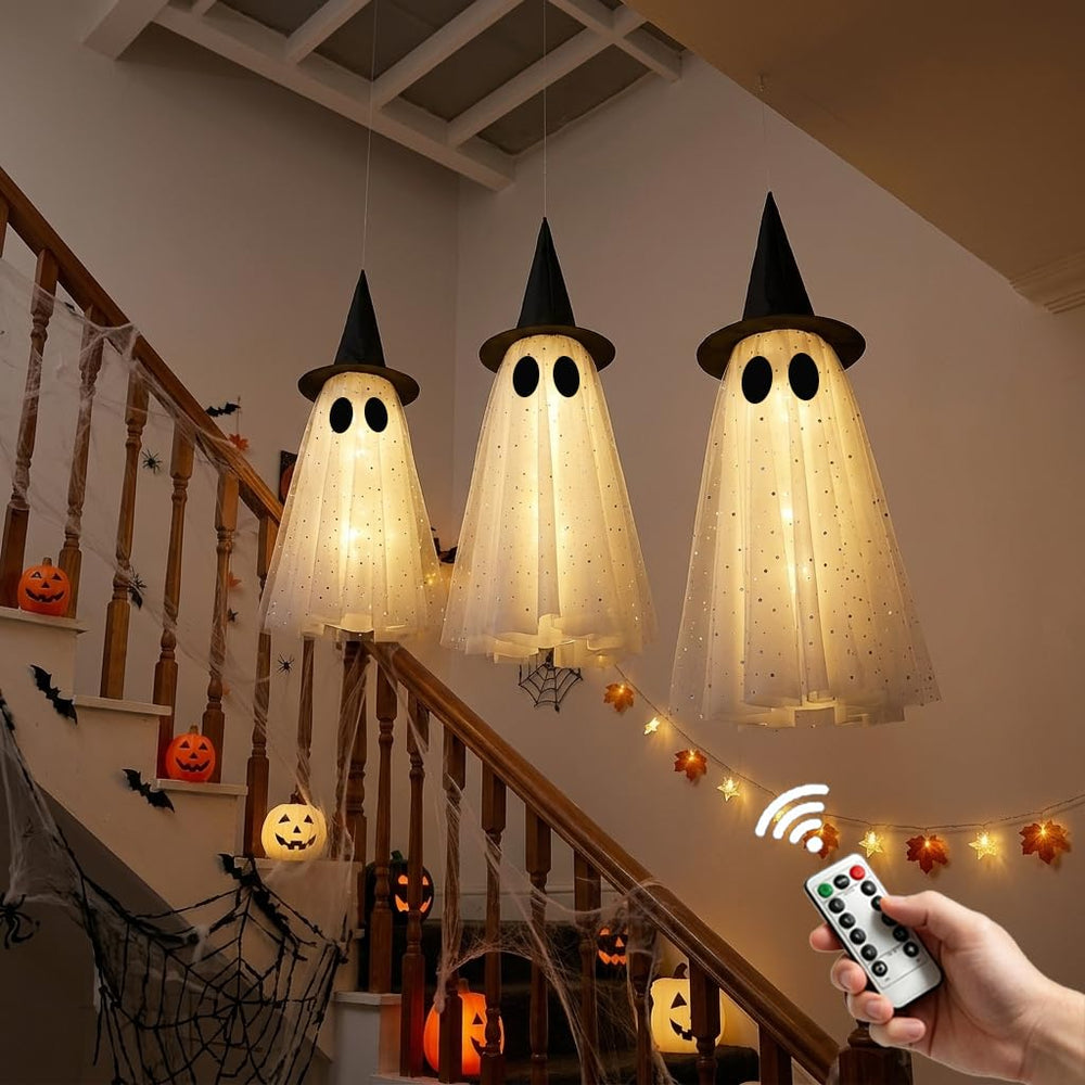 KIWDY hanging ghost lit on porch at dusk providing warm, welcoming glow