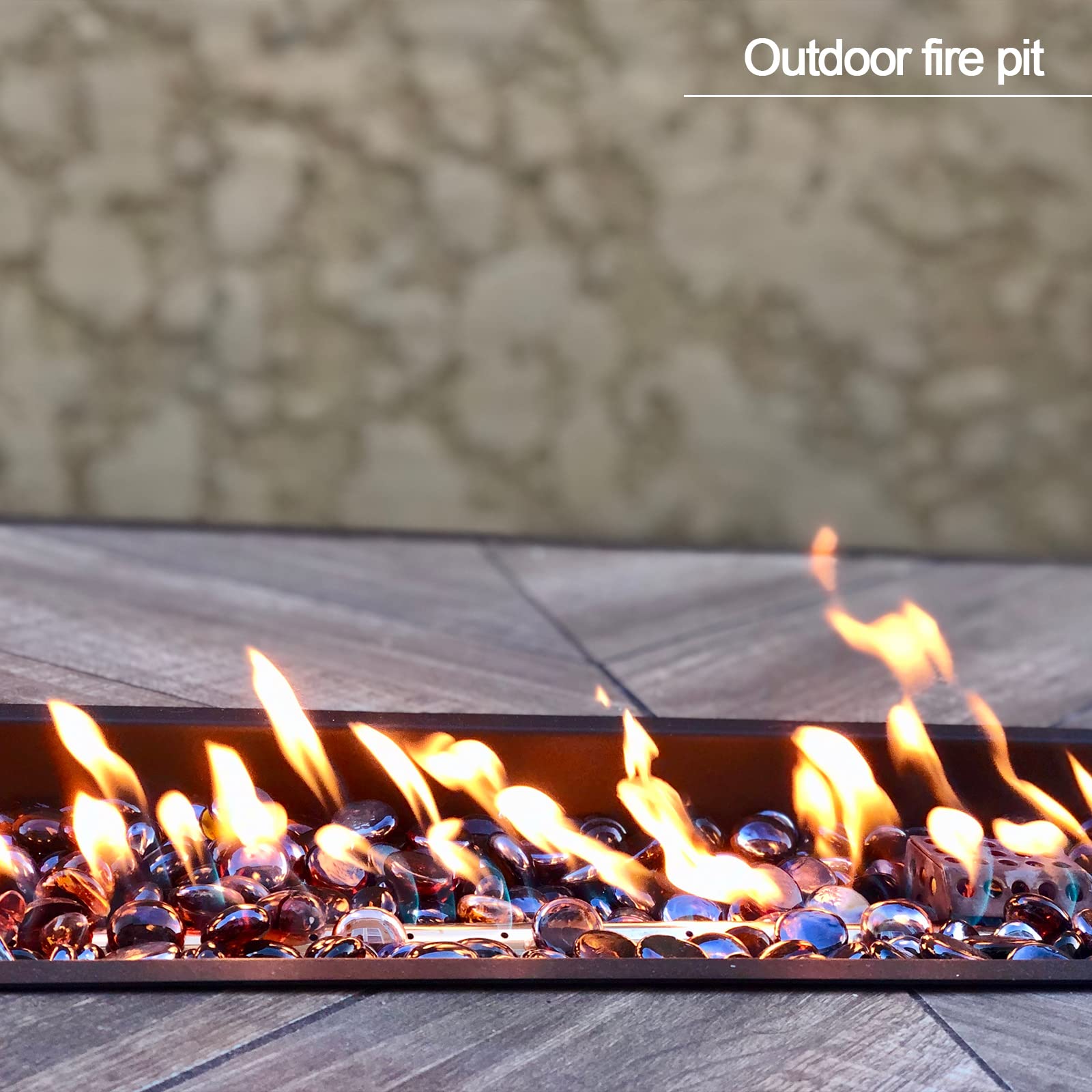 Kleuete beads in a tabletop fire bowl creating jewel-like sparkle and ambiance