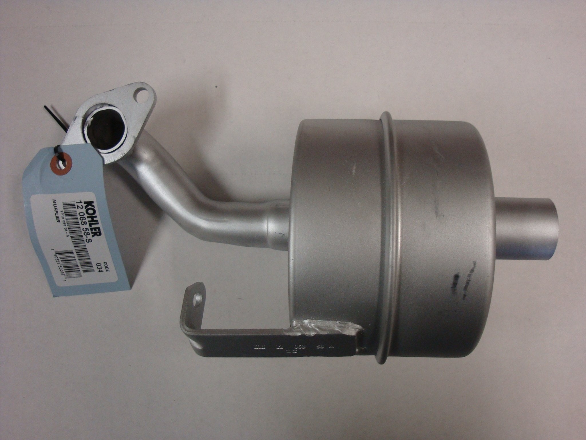 Kohler muffler front view showing overall 5-inch OD and 11-inch length for correct fit