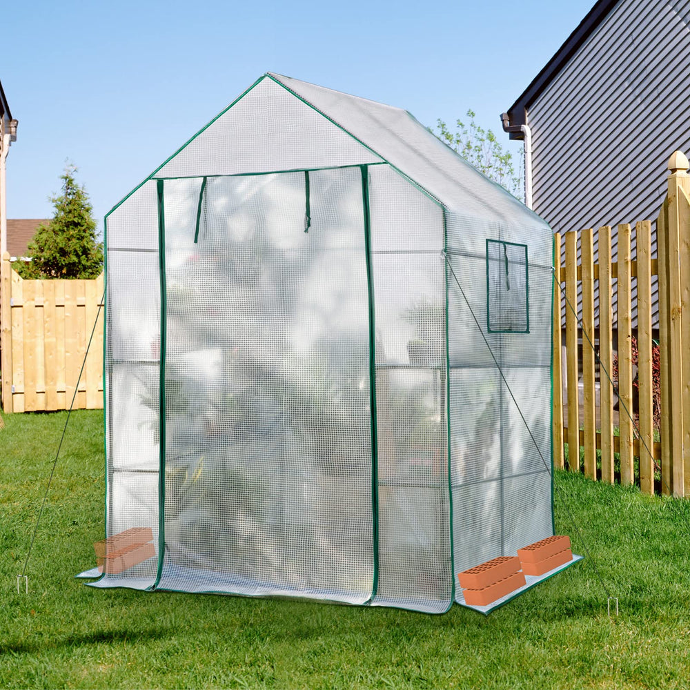 KOKSRY gardener tending plants inside greenhouse for comfortable care