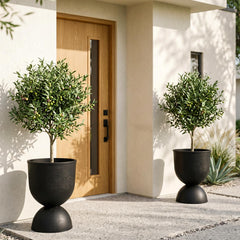 KOL black urn planter front view showing elegant silhouette and curb appeal