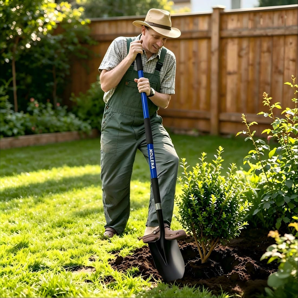 KOLEIYA shovel in garden use being driven into soil for planting and trenching