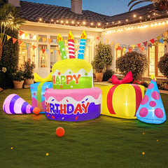 KOOY inflated cake displayed in yard at night creating eye-catching celebration