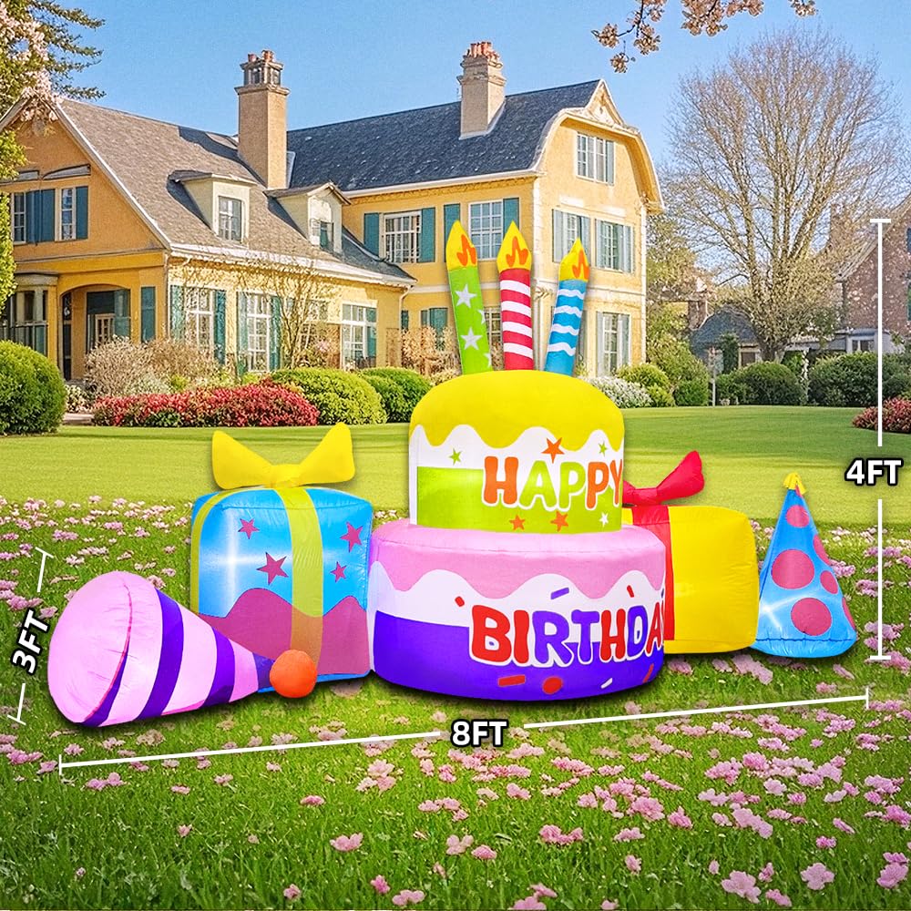 KOOY inflatable cake next to people showing scale and party focal point