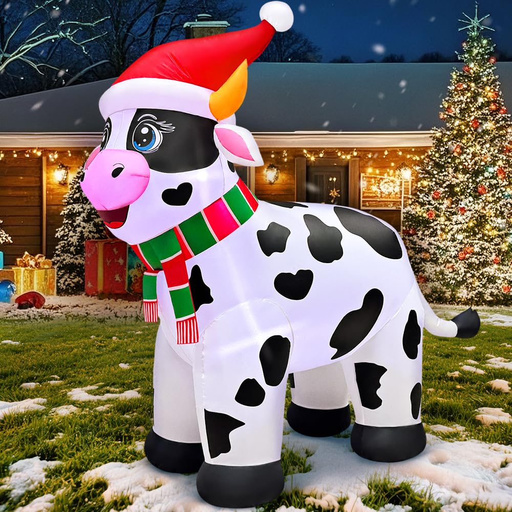 KOOY cow staged on lawn with other decorations offering holiday display inspiration