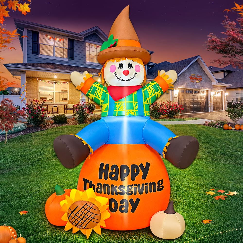 KOOY front view of seated scarecrow pumpkin, bright curb appeal