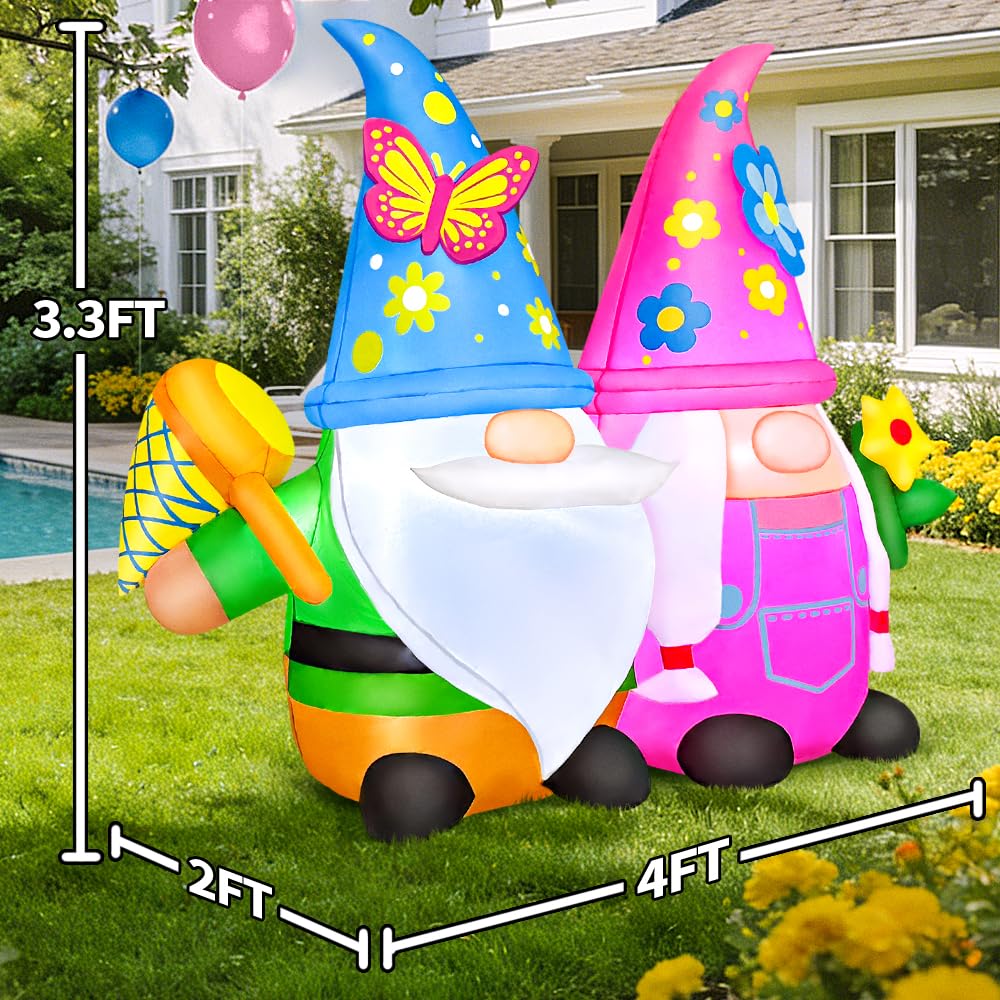 KOOY gnomes anchored on lawn with stakes for stable outdoor display