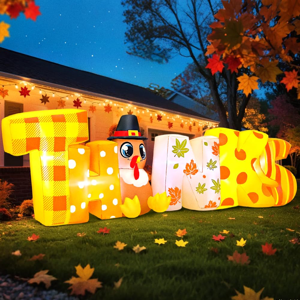 KOOY inflatable set on a lawn creating welcoming fall decor for guests