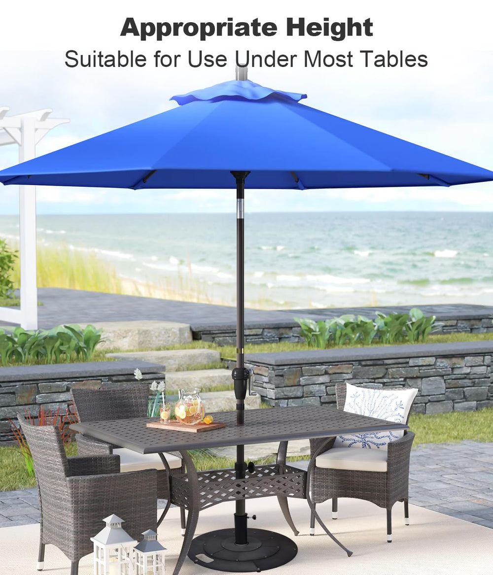 Koutemie base placed under patio table illustrating discreet functional fit