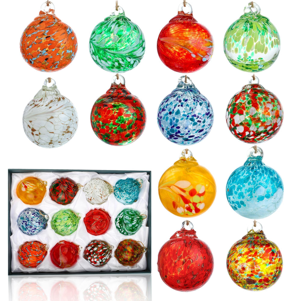 KRISININE ornaments hanging on a Christmas tree adding reflective sparkle to ornaments