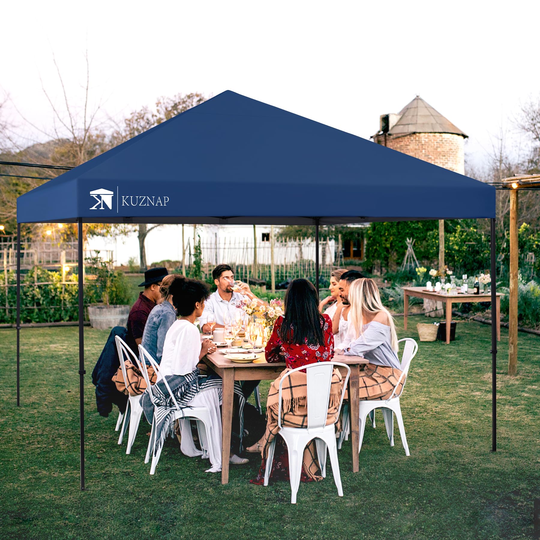 KUZNAP canopy over backyard gathering illustrating shade for guests benefit