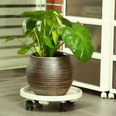 KvyusFlourish caster locked to secure heavy planter in place
