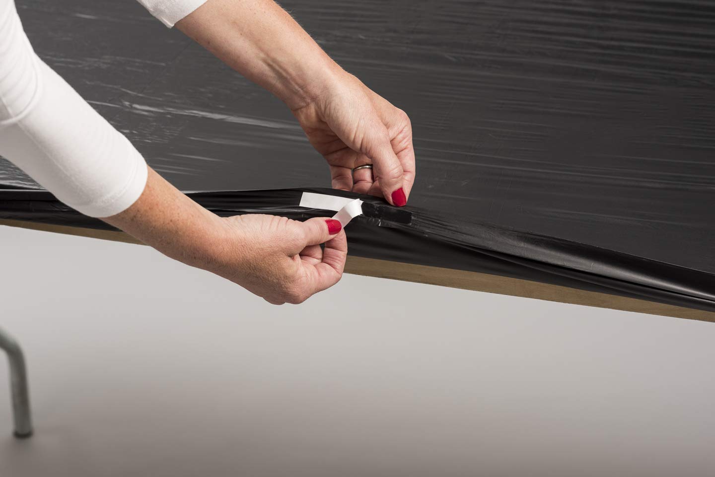 Kwik-Covers on an 8-foot banquet table demonstrating neat wrinkle-free protection