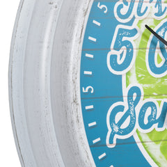 La Crosse Technology close-up of colorful lime and teal dial for easy readability