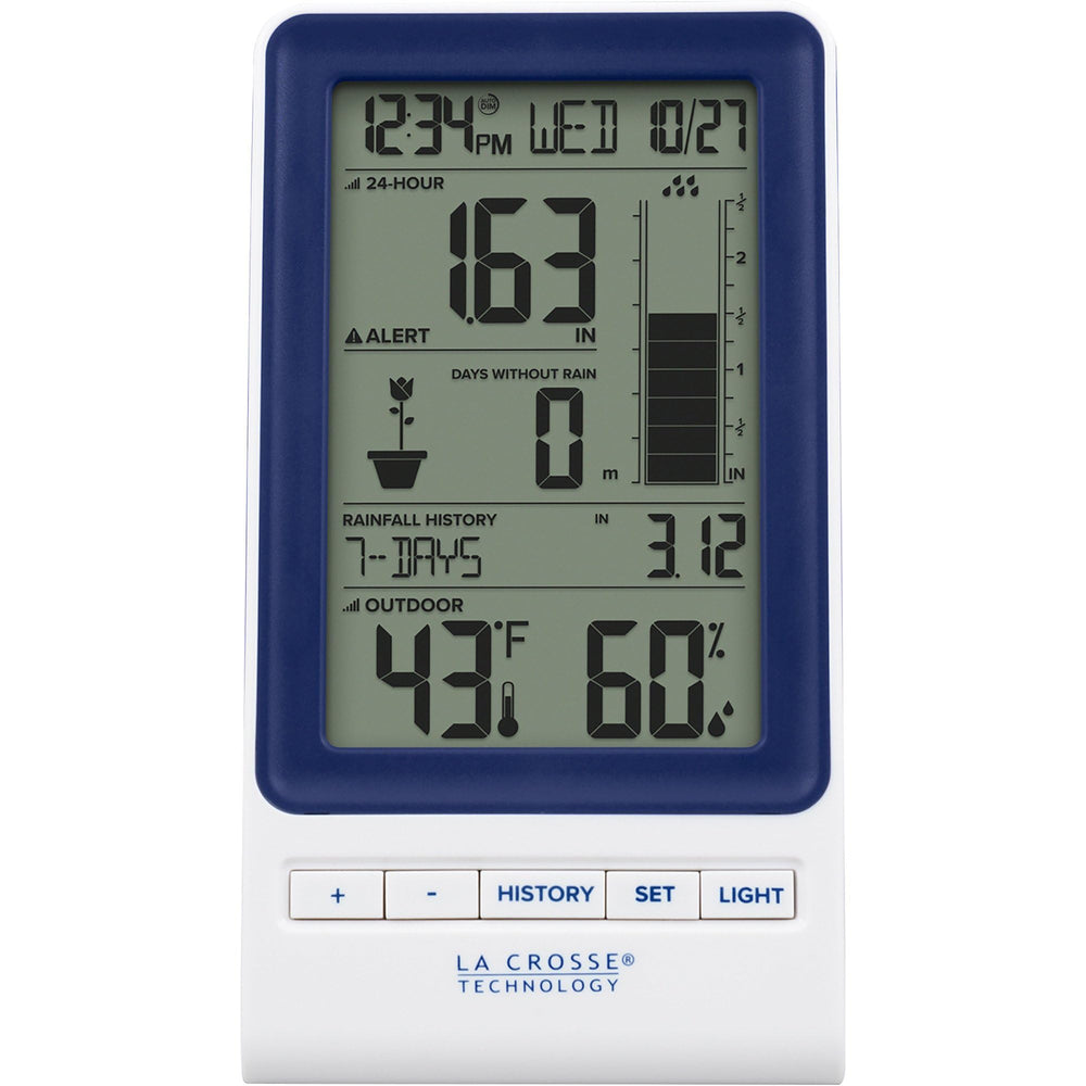 La Crosse Technology console on a table displaying current rain totals, temperature and humidity for quick decisions