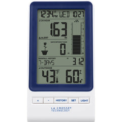 La Crosse Technology console on a table displaying current rain totals, temperature and humidity for quick decisions