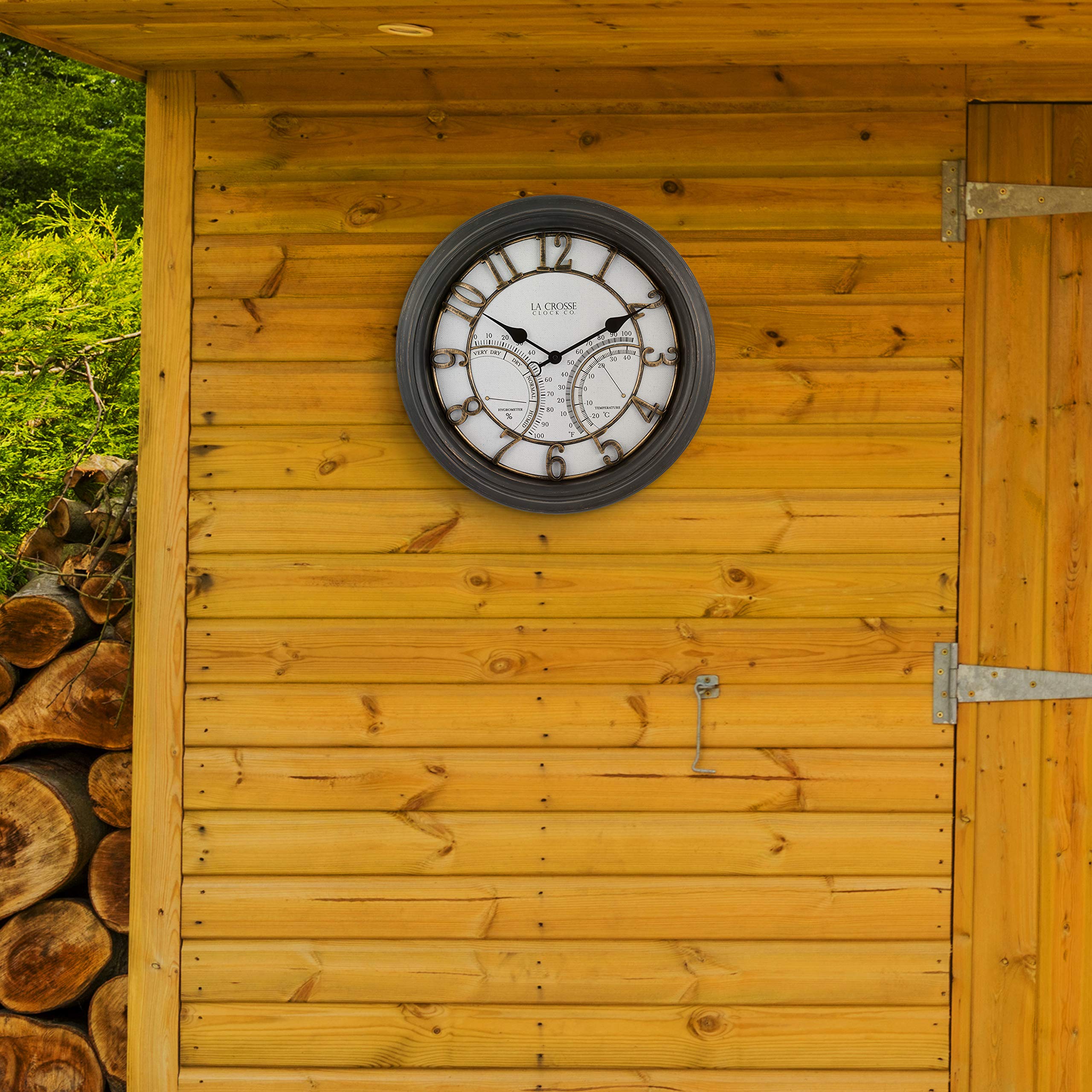 La Crosse Technology clock on wall next to plant to show scale and enhance decorative use