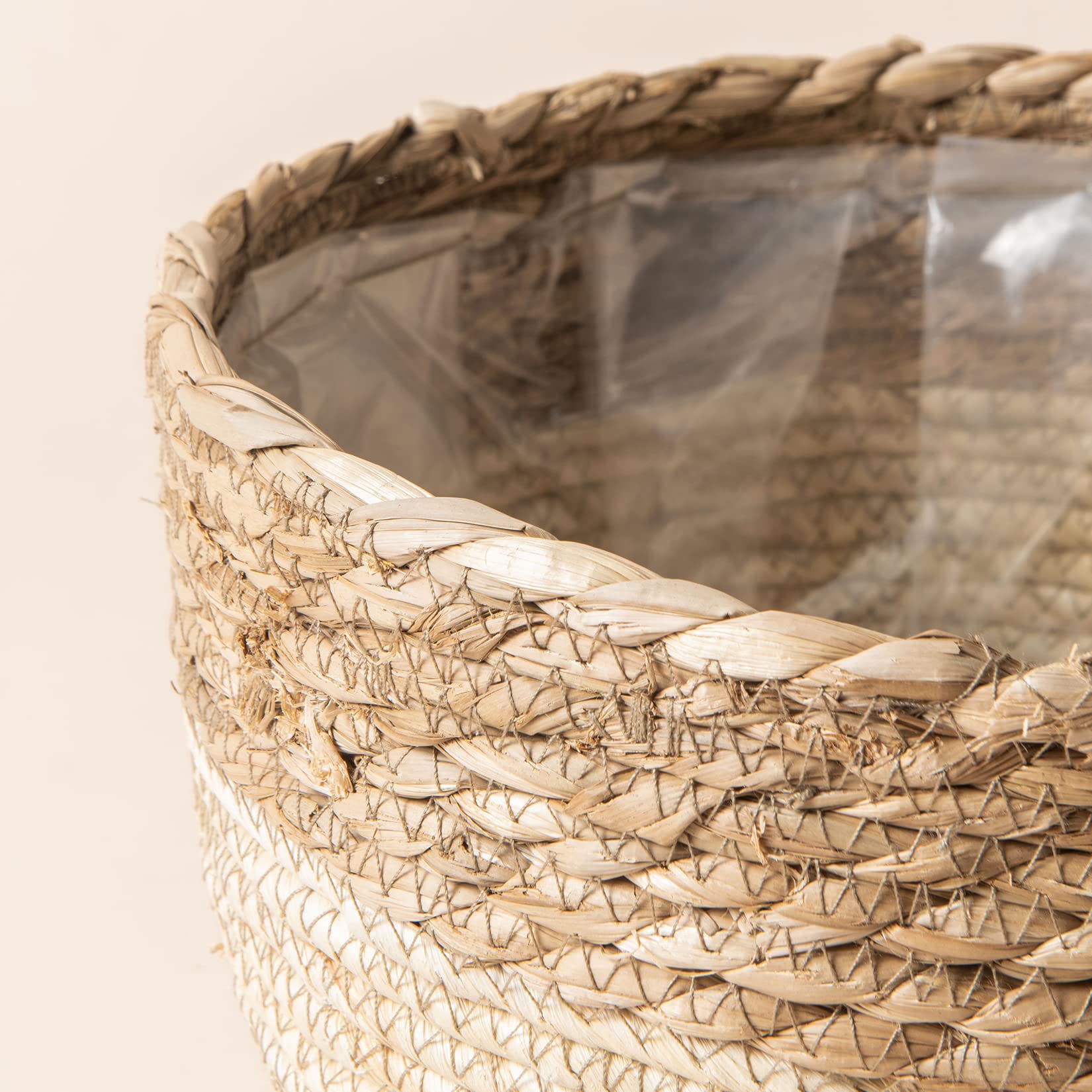LA JOLIE MUSE baskets holding potted plants demonstrating neat indoor display