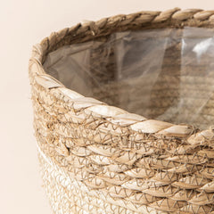LA JOLIE MUSE baskets holding potted plants demonstrating neat indoor display