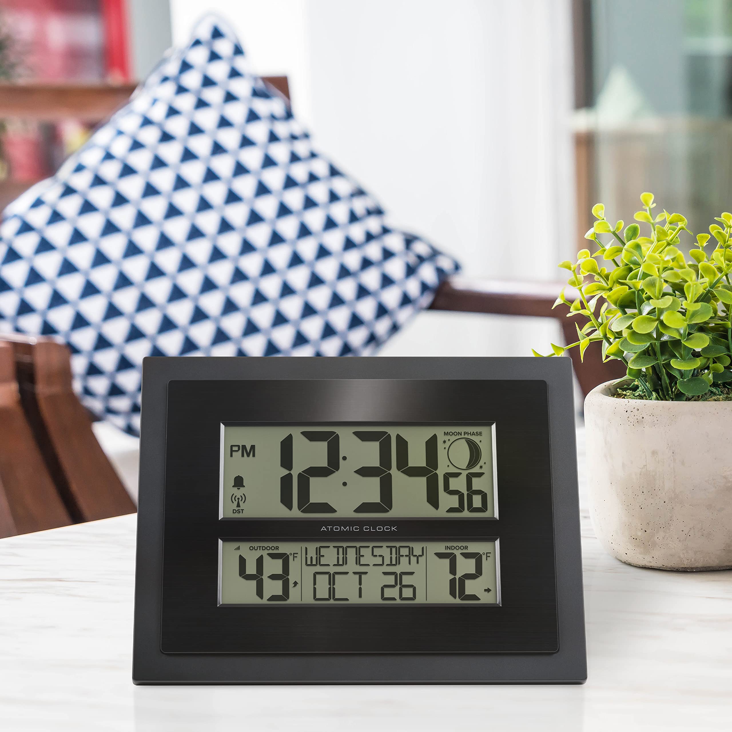 La Crosse Technology mounted on a living room wall offering unobtrusive time and temp info