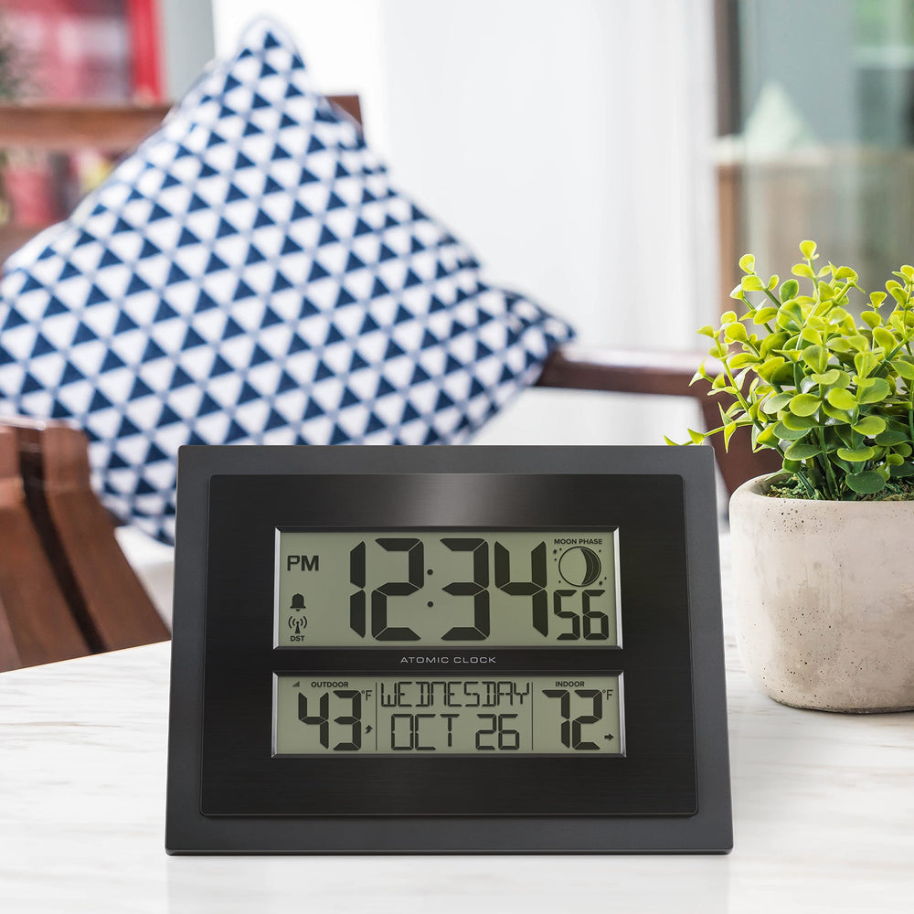 La Crosse Technology mounted on a living room wall offering unobtrusive time and temp info