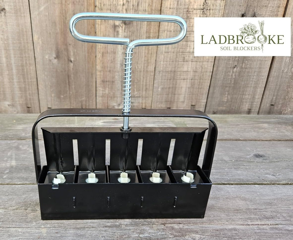 Ladbrooke Mini 5 top cavity close-up showing five 1.5-inch block molds for uniform blocks