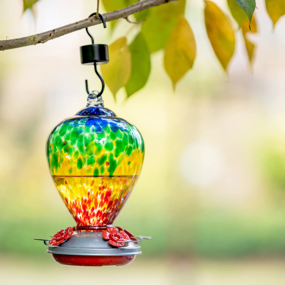 LaElvish Garden feeder held in hand to show 34oz capacity and practical scale