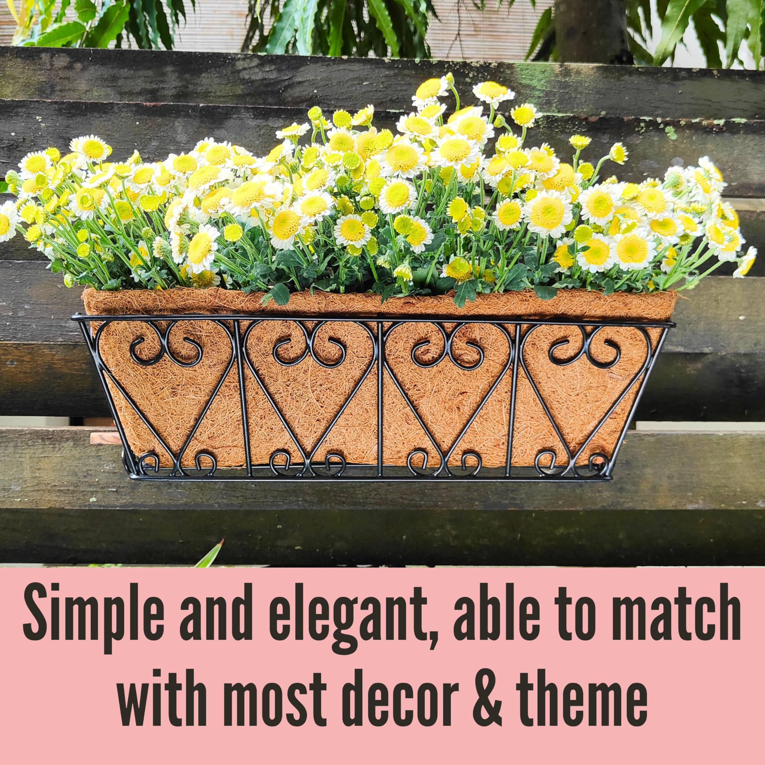 LáLáGreen planter attached to fence using ties showing versatile outdoor mounting benefit