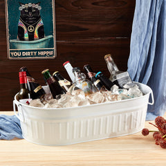 Lallisa tub styled as a planter with flowers demonstrating decorative garden use