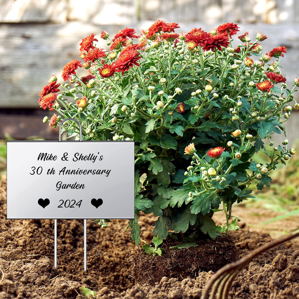 Landhoow markers arranged in garden bed demonstrating organized planting