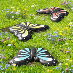 Landical front view of three butterfly stones showing colorful garden benefit