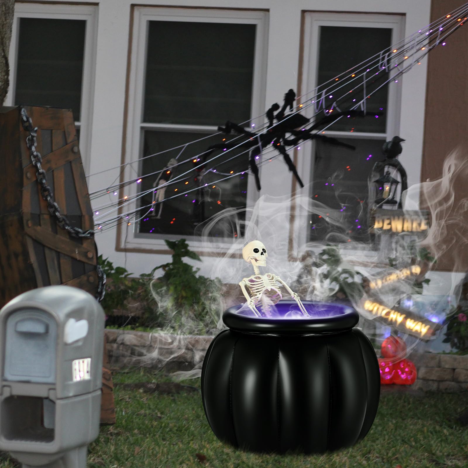 LaRandom cauldron inflated on lawn improving curb appeal at night